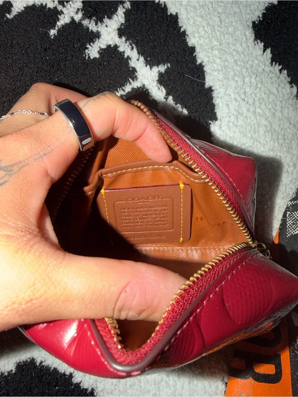 Coach Signature Embossed Cosmetic Pouch in glazed red